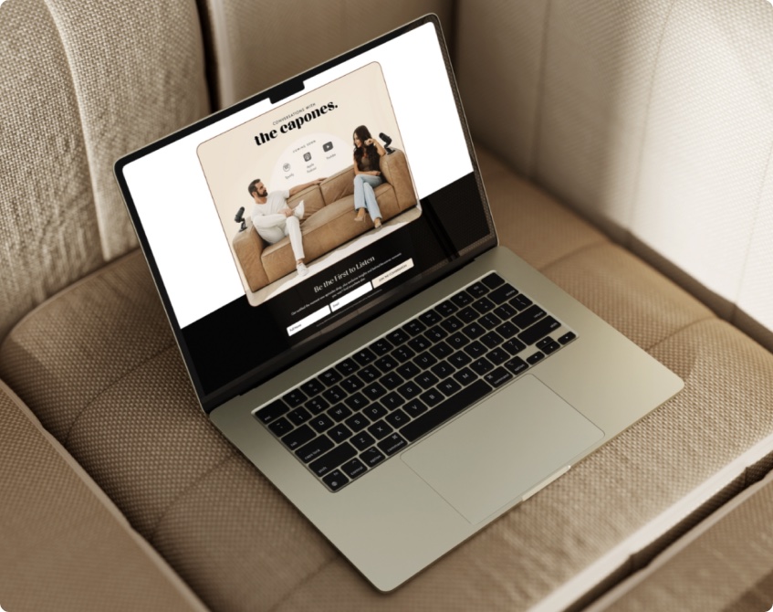 The Capones website on a laptop